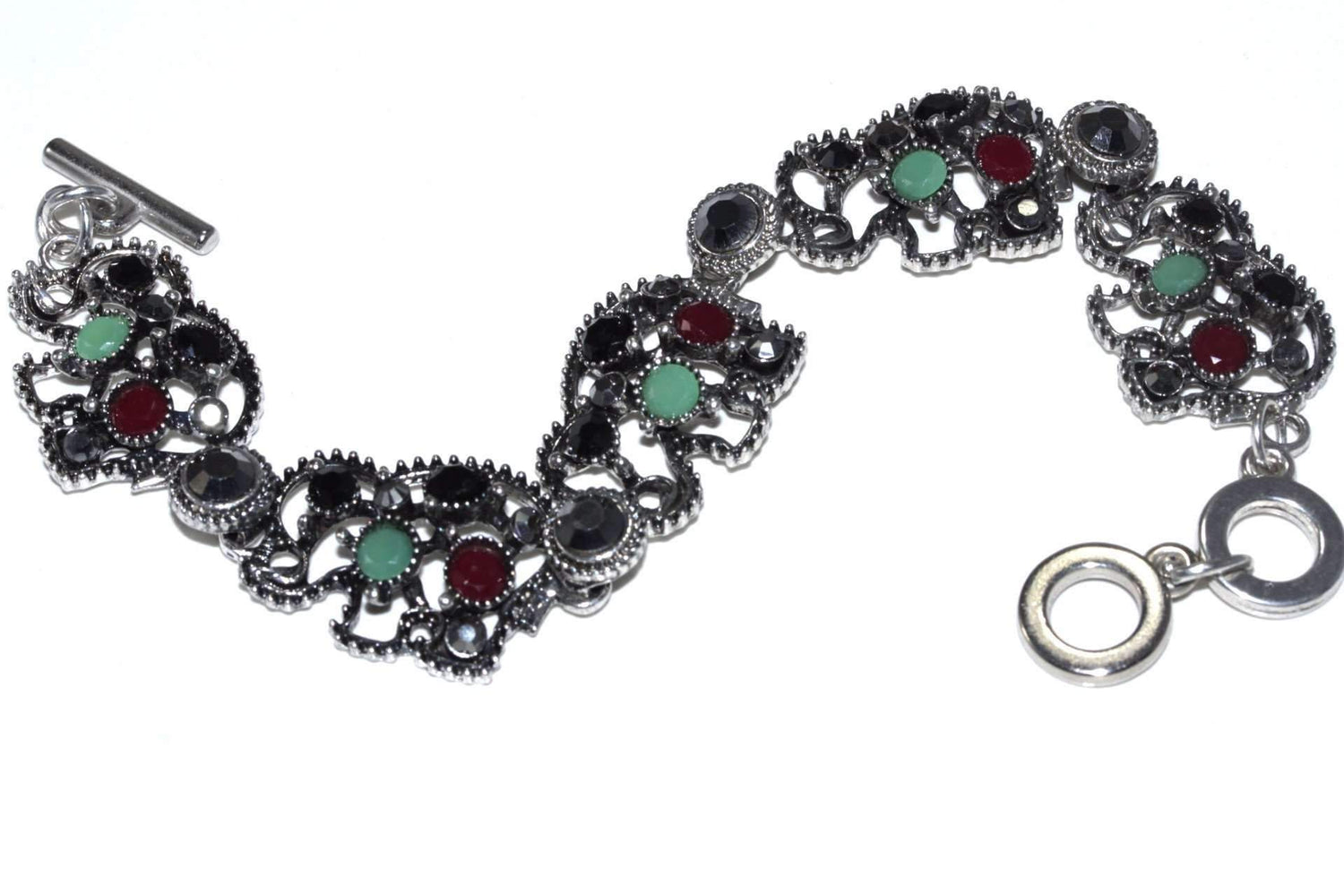 Silver Hestia Circle of Elephants bracelet featuring a charming design with elephants encircling the wrist in sterling silver.
