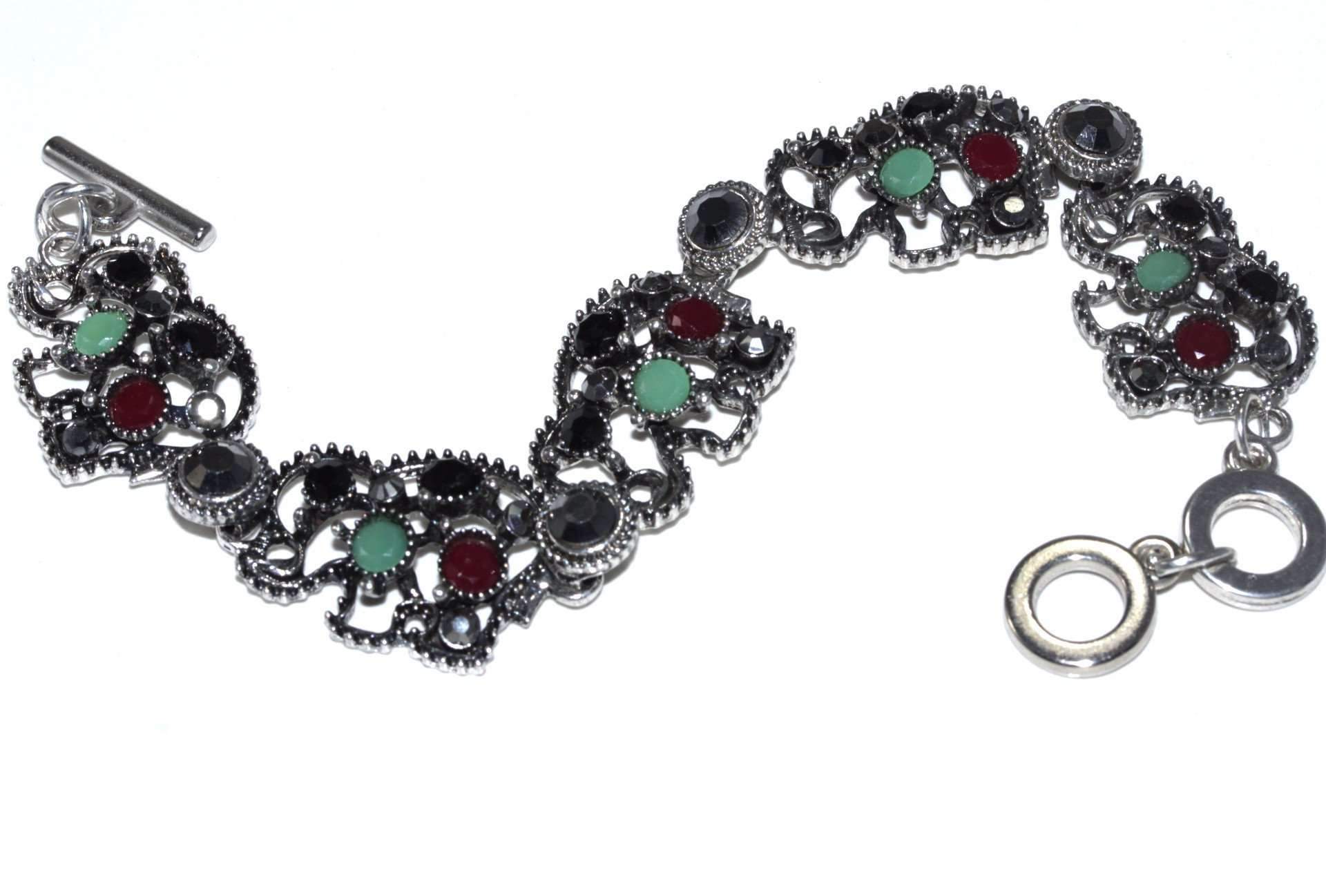 Silver Hestia Circle of Elephants bracelet featuring a charming design with elephants encircling the wrist in sterling silver.