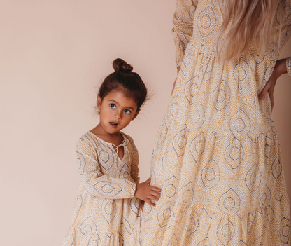 Cotton girl’s block printed kaftan dress from Ivory Meleager, featuring vibrant patterns, perfect for comfortable loungewear and gifts.