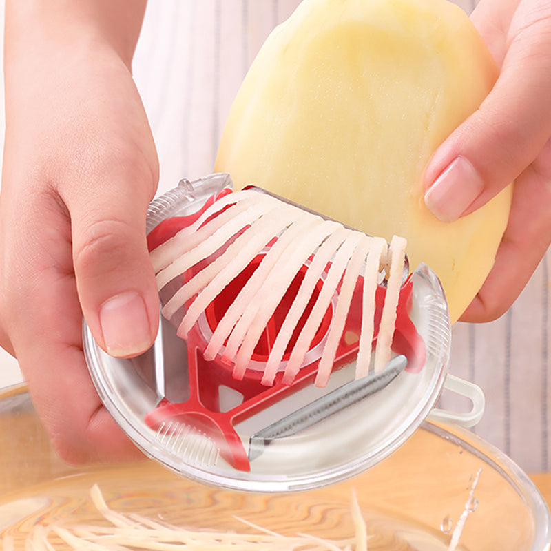 Jade Chrysippus multi-functional kitchen vegetable and fruit peeler with ergonomic handle and stainless steel blades.