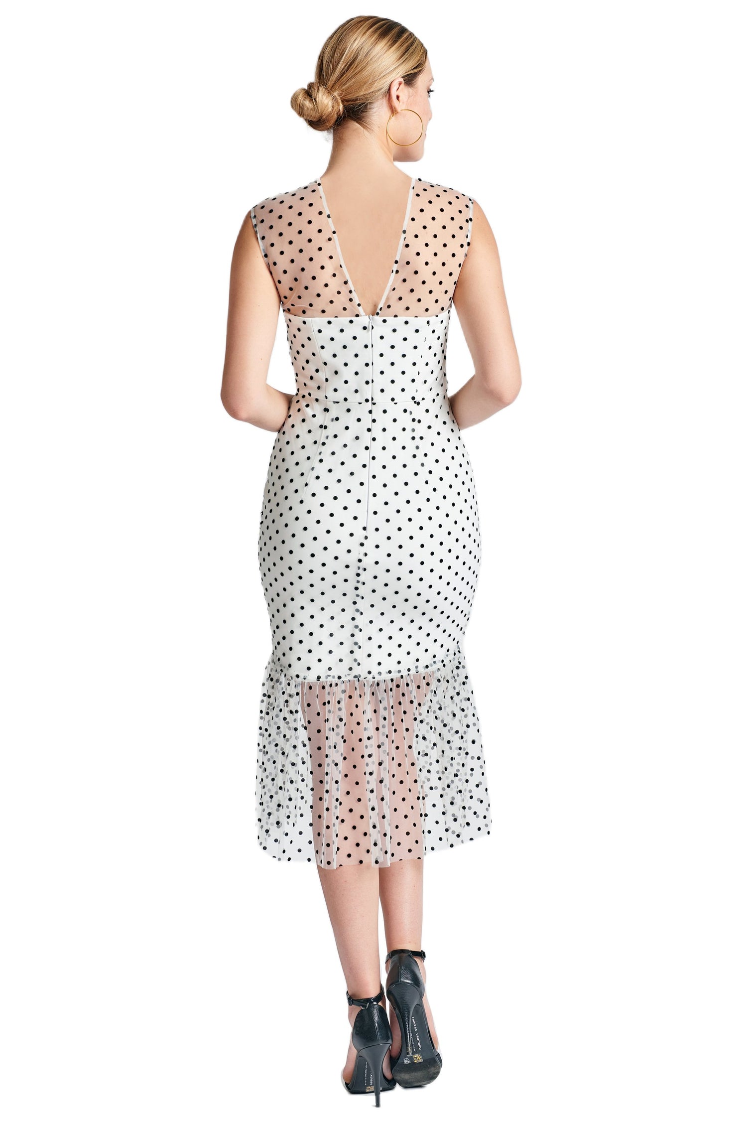 Back view of Peach Dionysus Muse Dress, sleeveless polka dot midi mesh dress with a fitted silhouette and stylish design.