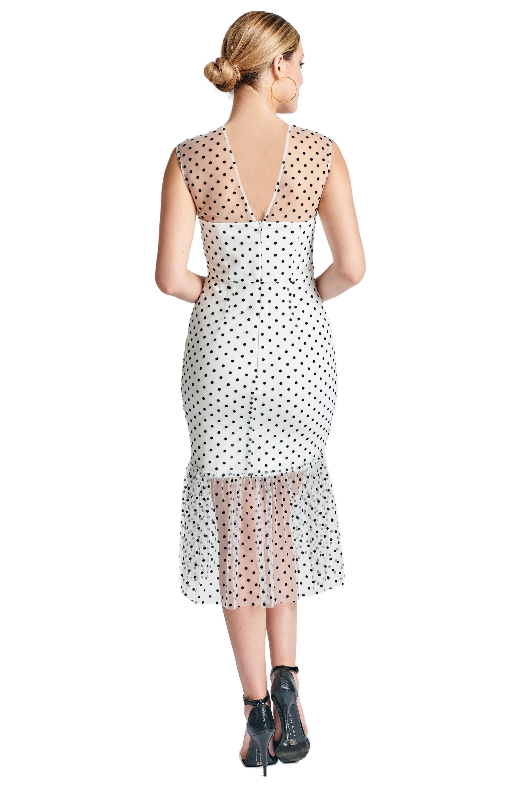 Back view of Peach Dionysus Muse Dress, sleeveless polka dot midi mesh dress with a fitted silhouette and stylish design.