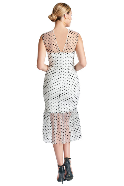 Back view of Peach Dionysus Muse Dress, sleeveless polka dot midi mesh dress with a fitted silhouette and stylish design.