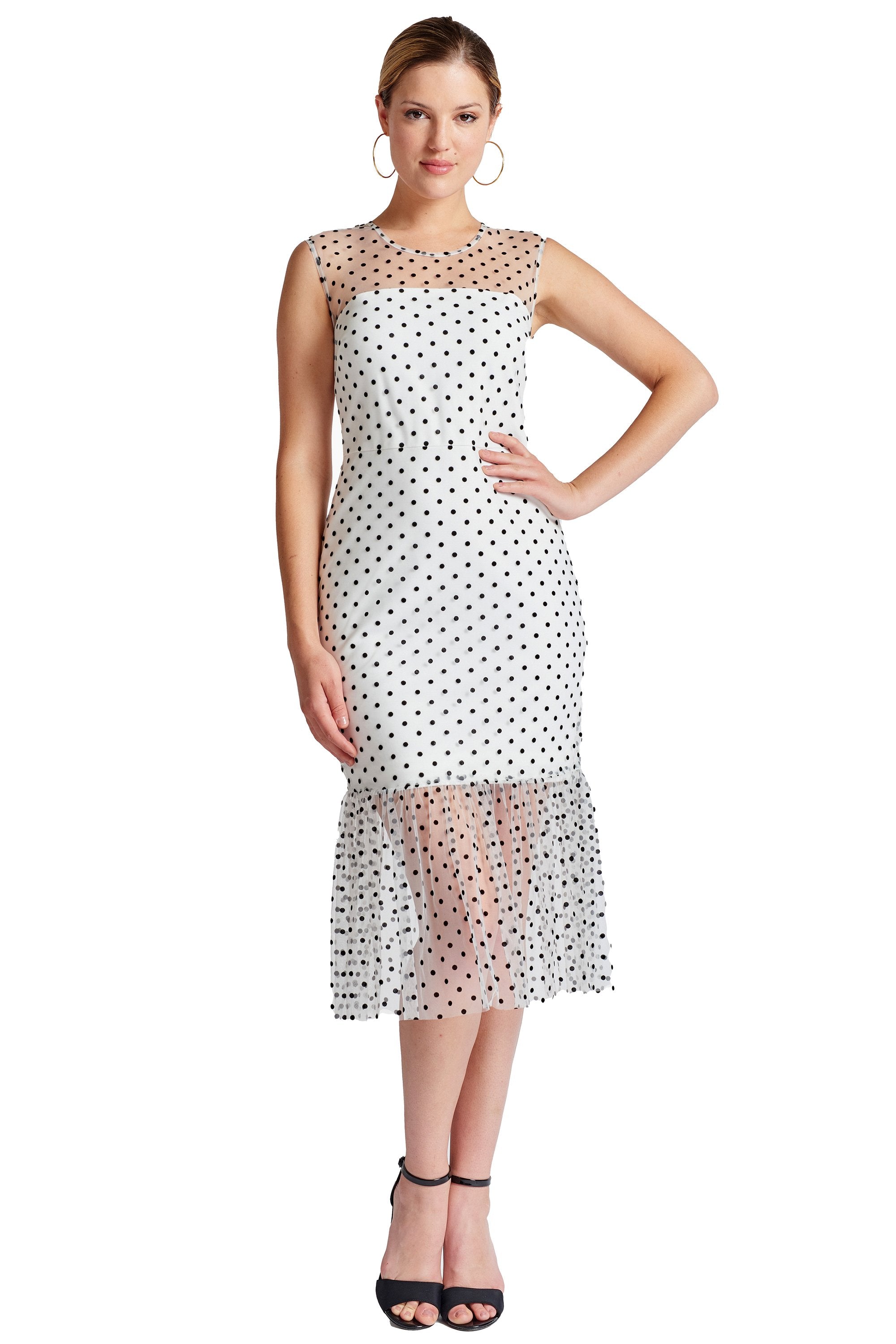 Peach Dionysus Muse sleeveless polka dot midi mesh dress displayed on a hanger with a ruffled hem and classic polka dot pattern.