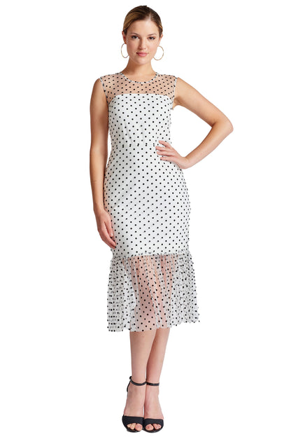 Peach Dionysus Muse sleeveless polka dot midi mesh dress displayed on a hanger with a ruffled hem and classic polka dot pattern.