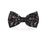 Black dog bow tie featuring music notes design, stylish pet accessory from Plum Semele for fashionable canine wear.