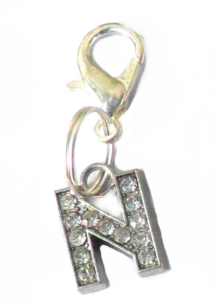 Salmon Oscar A-Z crystal letter pet charm attached to a leash, featuring sparkling crystal embellishments for pet accessories.
