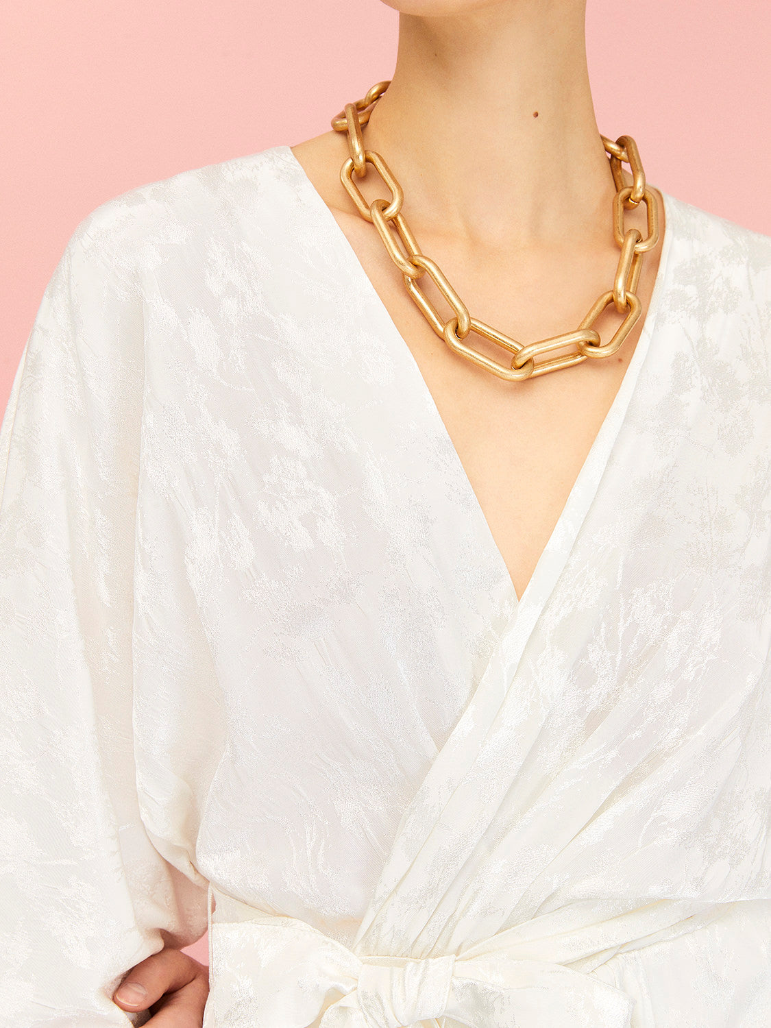 Bronze Aphrodite belted wrap dress for women, stylish and comfortable, featuring a flattering silhouette and elegant design.