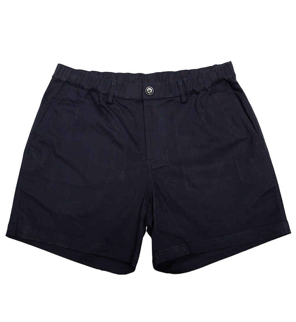 Ruby Tartarus navy cotton swimwear shorts laid flat, showing the lightweight fabric and relaxed fit perfect for summer swimming.
