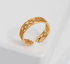 Gold Hélodie ring from Lime Cress Jewelry & Watches collection, featuring a sleek, elegant design with a smooth band.