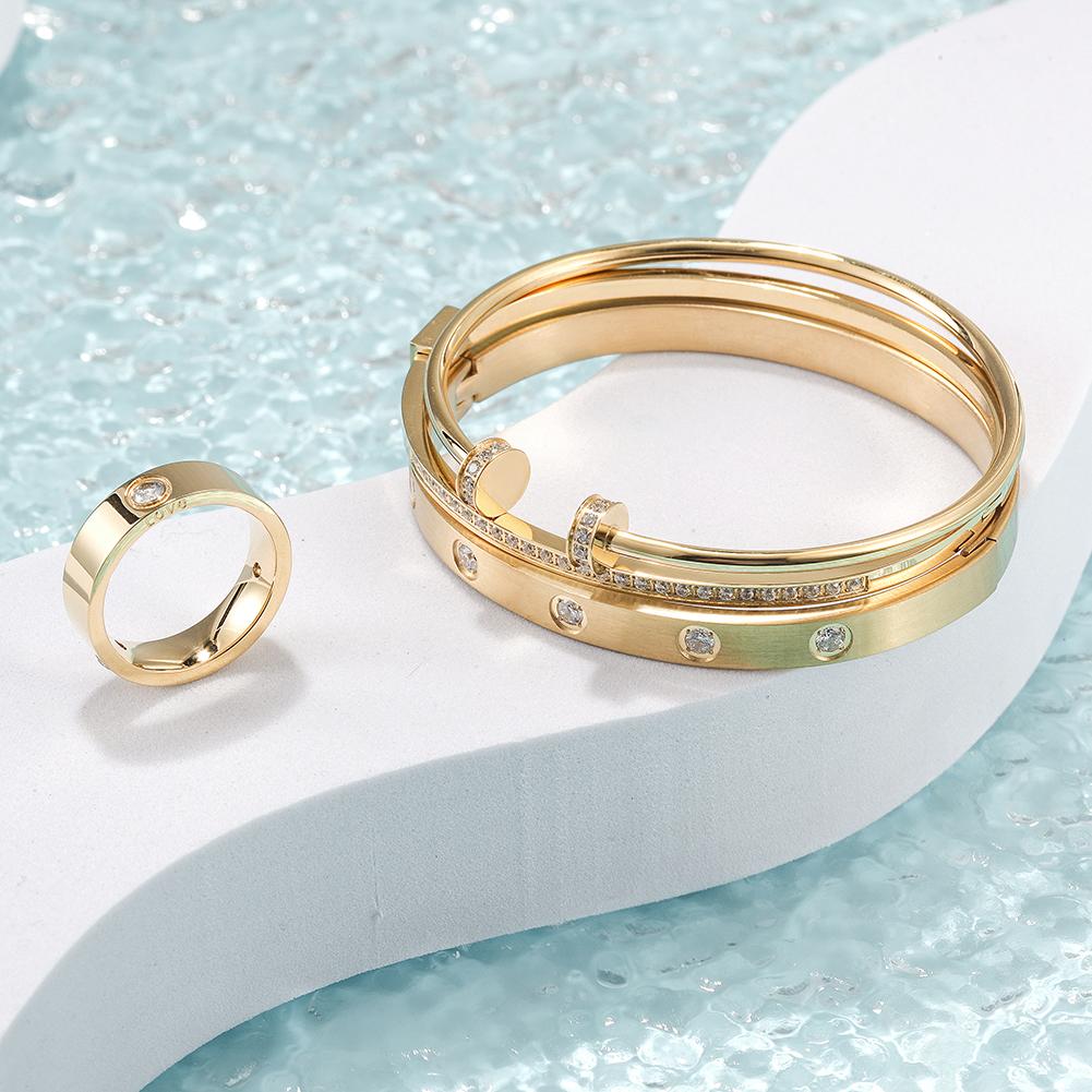 Set of layered bangle rings from Lavender Phoebe featuring multiple stylish silver rings with intricate designs.