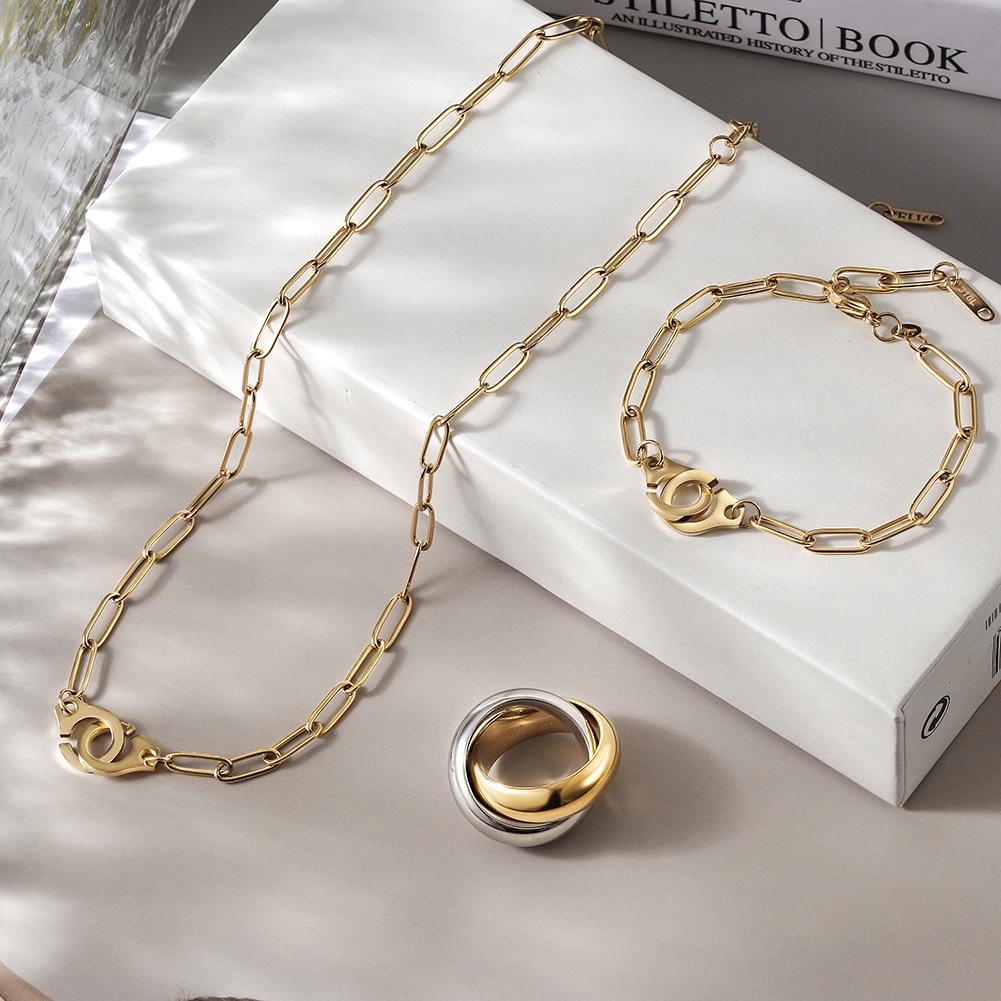 Lavender Phoebe Paperclip Link Jewelry Set featuring gold-tone paperclip chain necklaces and matching earrings.