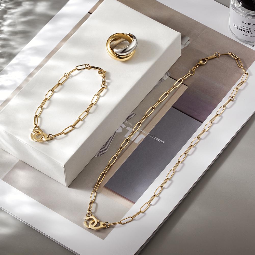 Lavender Phoebe Paperclip Link Jewelry Set featuring layered chain necklaces and matching earrings with gold-tone finish.