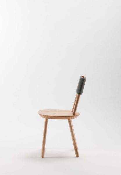 Aquamarine Poppy Naïve Dining Chair with wooden frame and upholstered seat, showcasing a modern, minimalist furniture design.