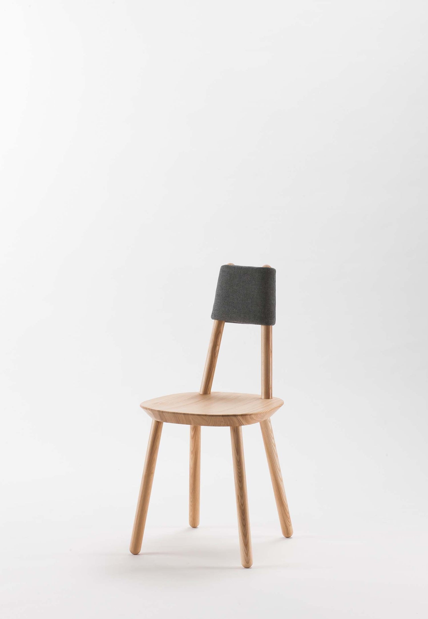 Aquamarine Poppy Naïve Dining Chair with wooden legs and upholstered seat, modern furniture design for dining rooms.