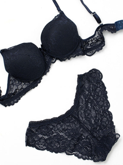 Navy blue bra and panty set for women by Harlequin Icarus, featuring comfortable matching lingerie with lace details.
