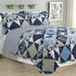 Azure Zeus Kim 3-piece quilt set in navy with matching bed linens, perfect for cozy, stylish bedroom decor.