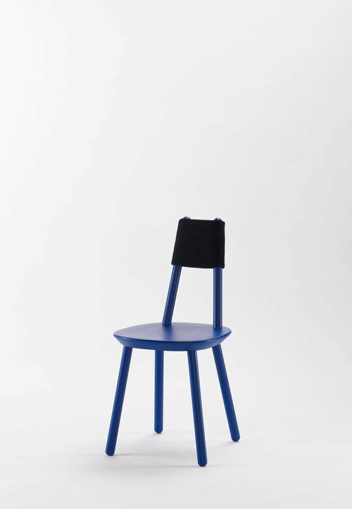 Aquamarine Poppy Naïve Dining Chair with blue upholstered seat and wooden legs, showcasing modern furniture design.
