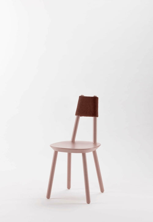 Naïve dining chair by Aquamarine Poppy in dusty pink fabric with wooden legs, modern furniture design for dining room decor.