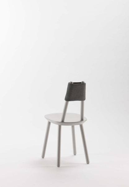 Aquamarine Poppy Naïve Dining Chair with grey upholstered seat and wooden legs, modern furniture design.