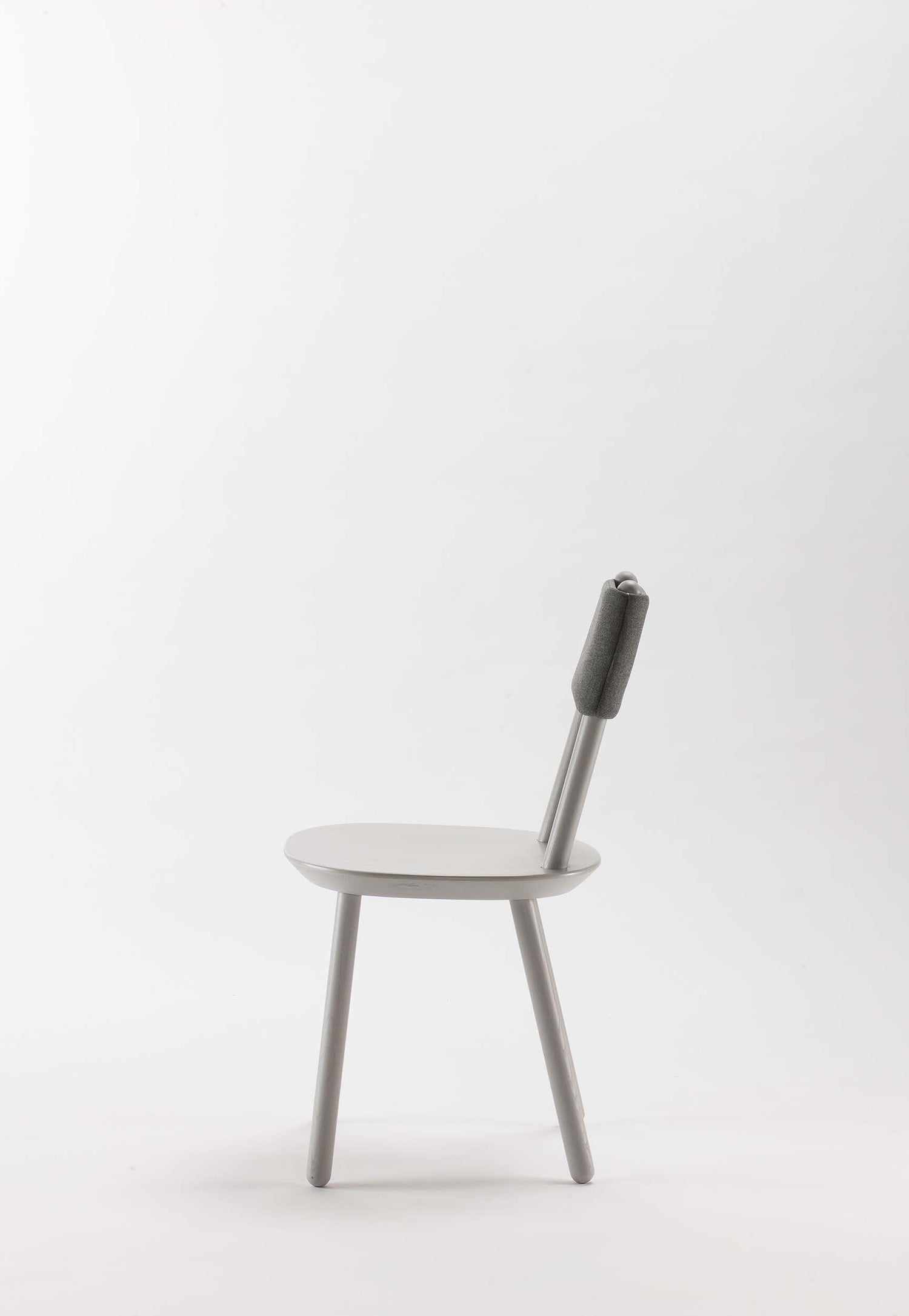 Aquamarine Poppy Naïve Dining Chair with grey fabric upholstery and wooden legs, modern furniture piece for dining rooms.