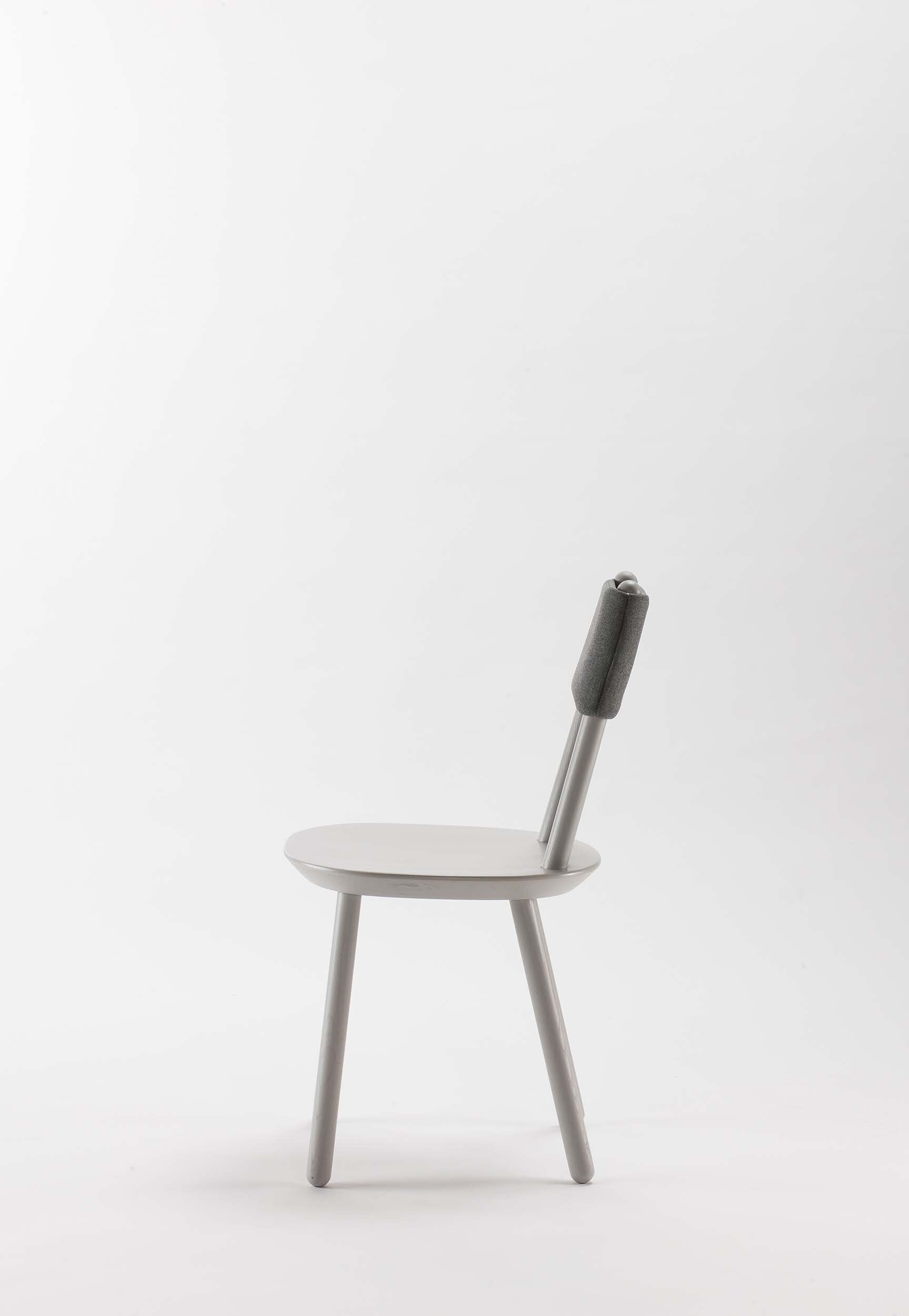 Aquamarine Poppy Naïve Dining Chair with grey fabric upholstery and wooden legs, modern furniture piece for dining rooms.