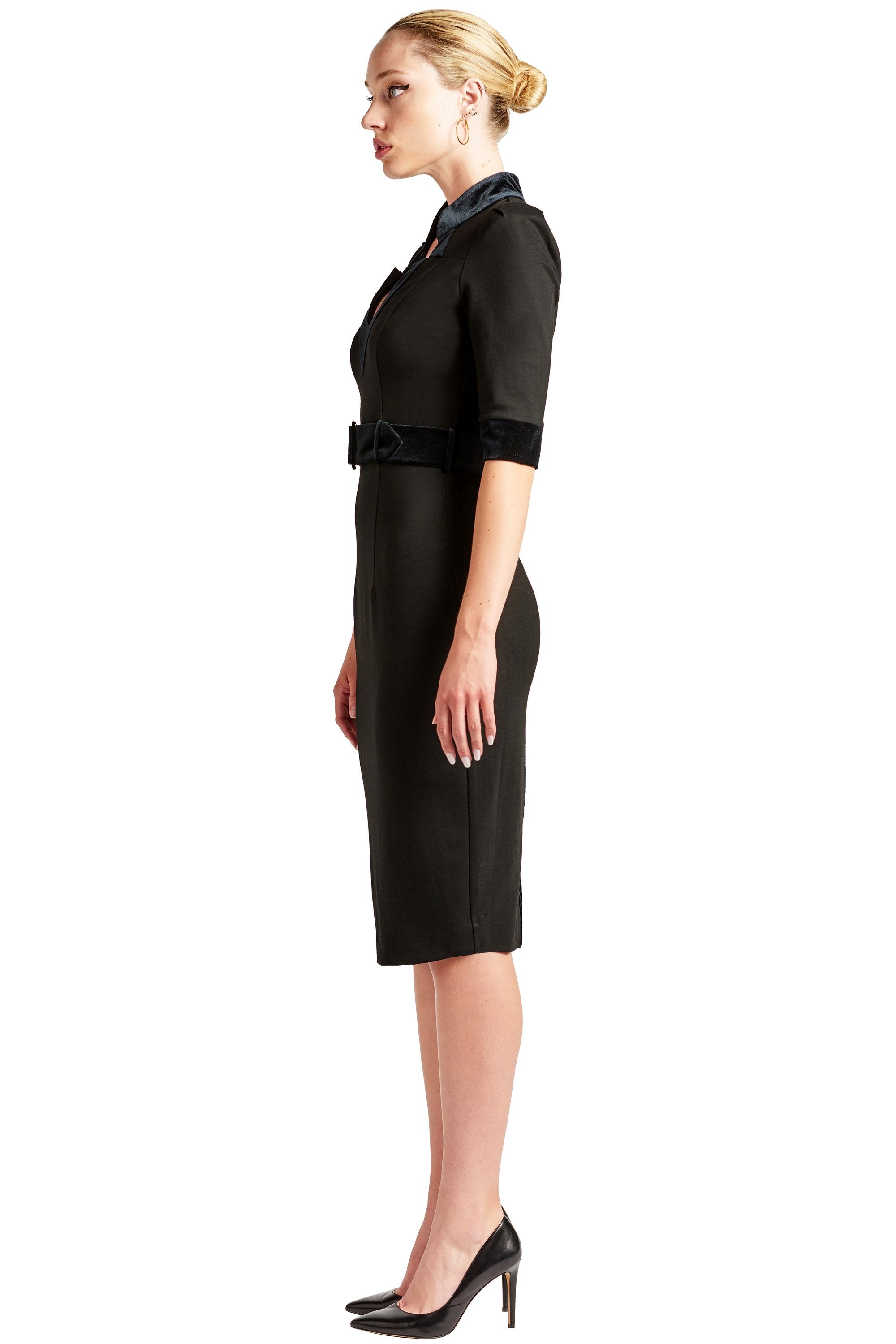 Peach Dionysus Nicola sheath dress with elbow sleeves and notch neck, made from ponte fabric, shown from a side view.