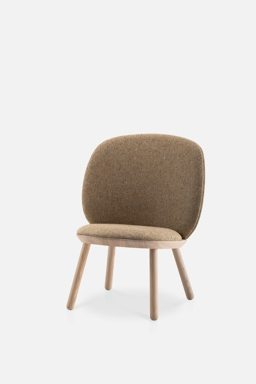 Aquamarine Poppy Naïve Low Chair made of wood with a minimalist design and neutral fabric upholstery, placed in a modern living space.