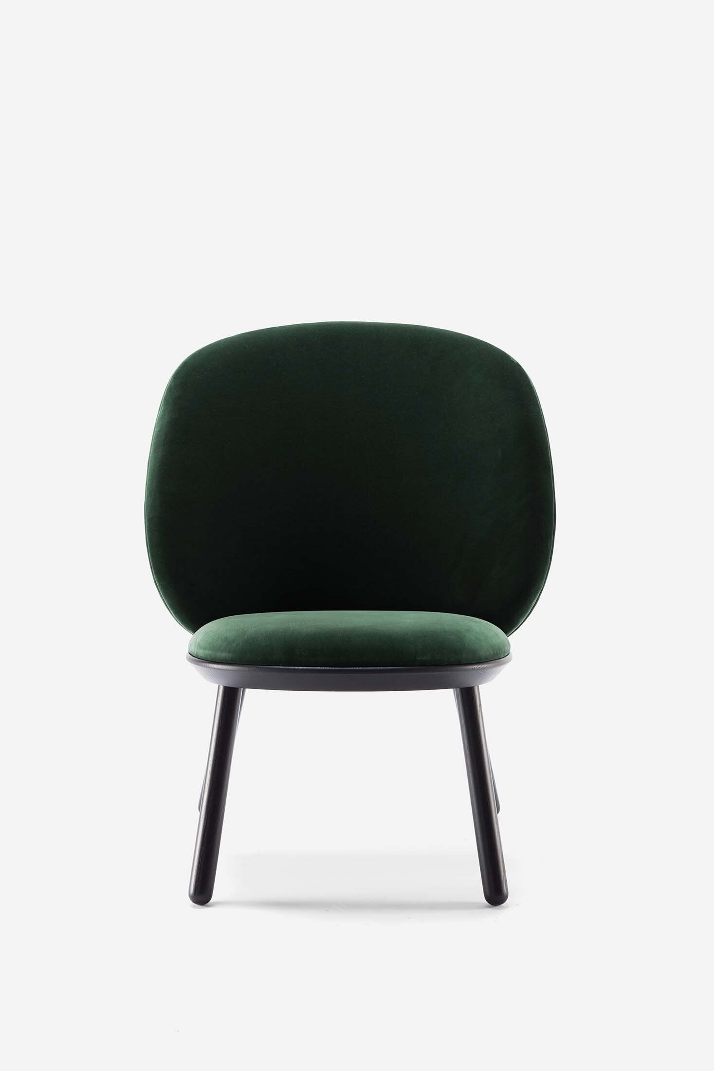Aquamarine Poppy Naïve Low Chair in green with a modern, minimalist design, featuring a curved seat and wooden legs.