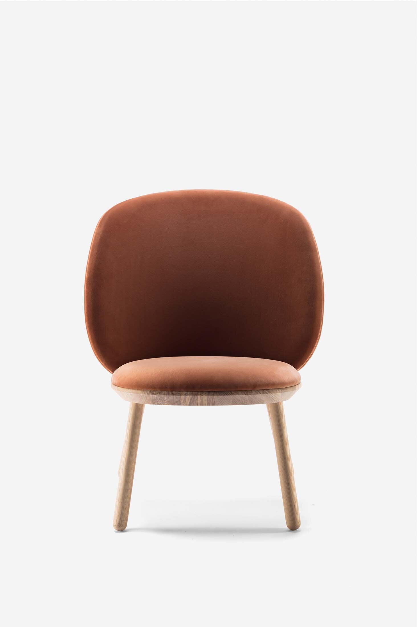 Aquamarine Poppy Naïve Low Chair in earthy terracotta color, showcasing modern furniture design with a sleek wooden frame.