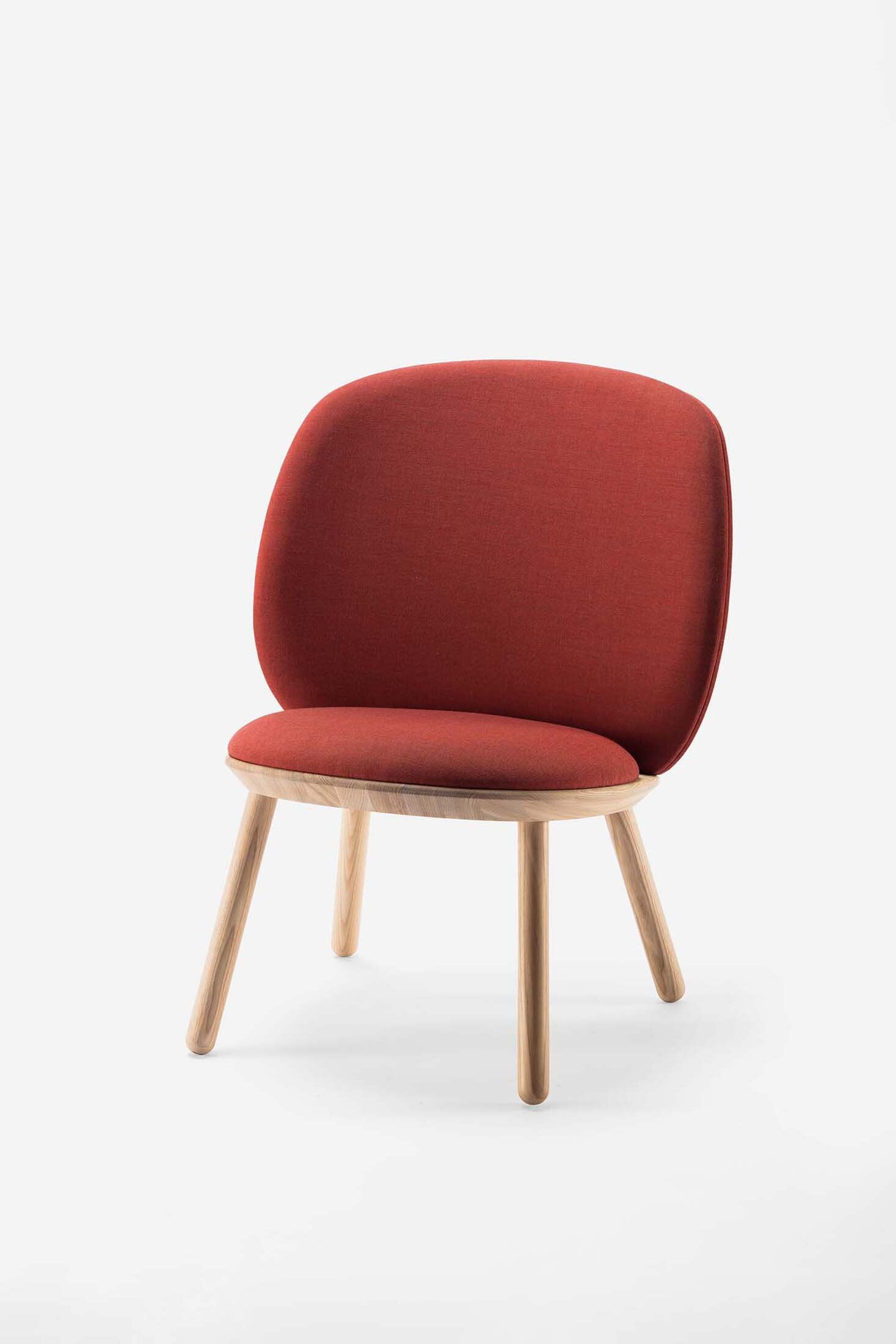 Naïve Low Chair by Aquamarine Poppy in cognac with wooden legs, stylish and modern furniture piece for living spaces.