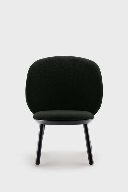 Naïve Low Chair by Aquamarine Poppy in black with a modern, minimalist design, featuring a sleek wooden frame and comfortable seat.