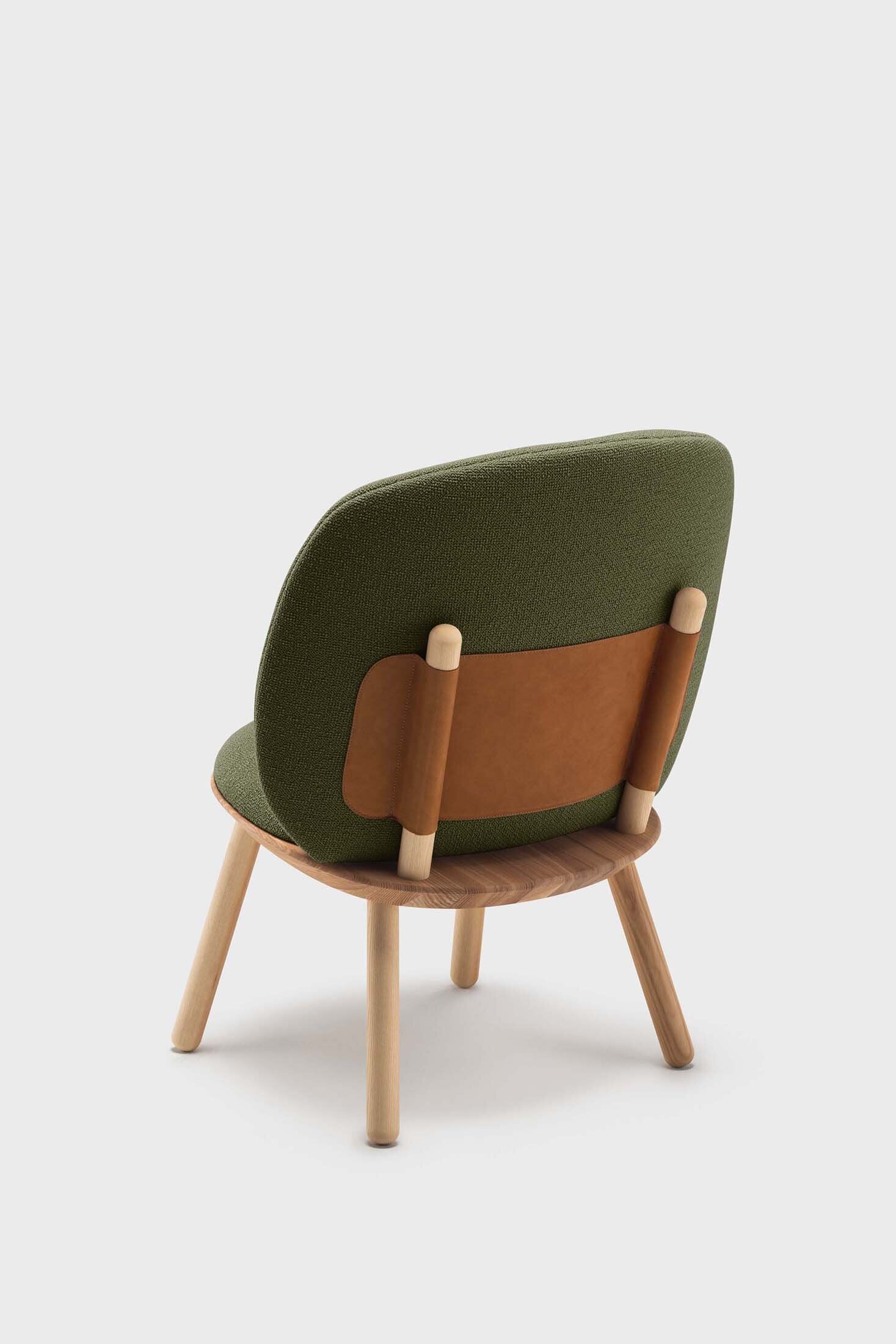 Aquamarine Poppy Naïve Low Chair with green cushioned seat and wooden legs, showcasing a modern furniture design.