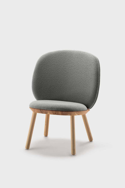 Aquamarine Poppy Naïve Low Chair in grey, modern furniture with smooth curves and a minimalist design, shown from the side.