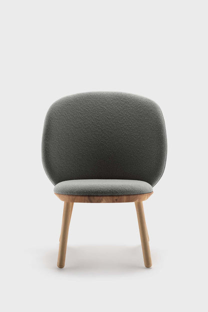 Aquamarine Poppy Naïve Low Chair in grey fabric, showcasing a modern, minimalist furniture design with wooden legs.
