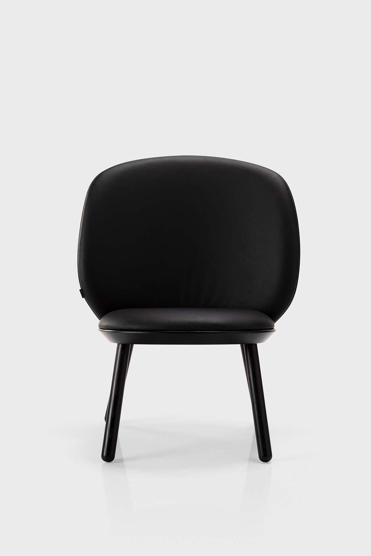 Black Naïve Low Chair by Aquamarine Poppy, modern furniture piece with a sleek design and comfortable low-height seating.