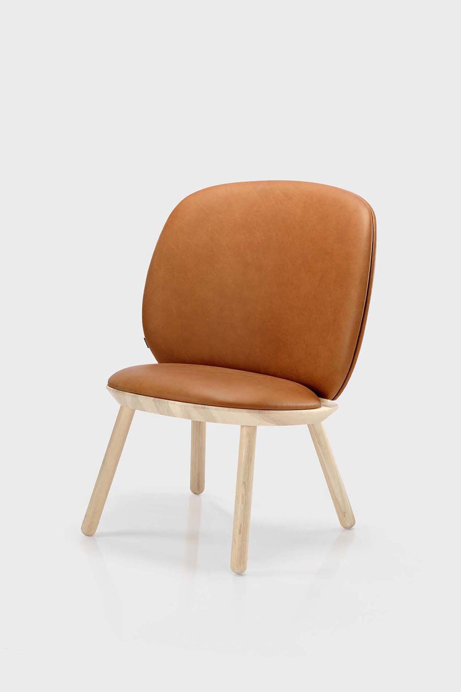 Aquamarine Poppy Naïve Low Chair made of smooth, light-colored wood with a simple, modern design and a cushioned seat.