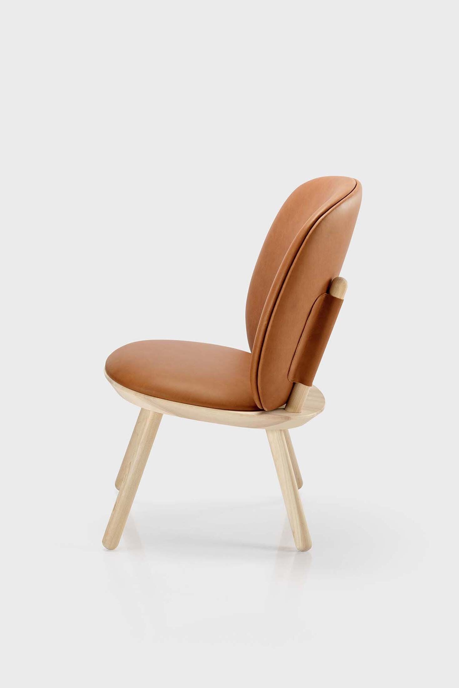 Aquamarine Poppy Naïve Low Chair with smooth wooden legs and a cozy, rounded fabric seat in a modern furniture design.