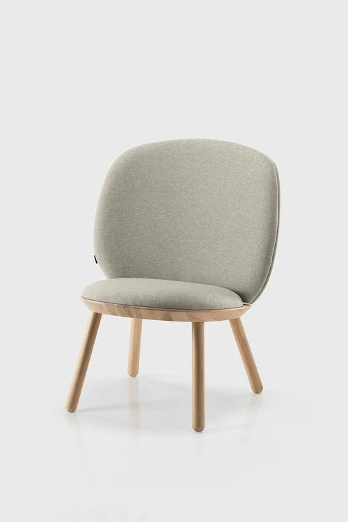 Beige Naïve Low Chair by Aquamarine Poppy, showcasing modern furniture with a sleek design and comfortable low seating style.