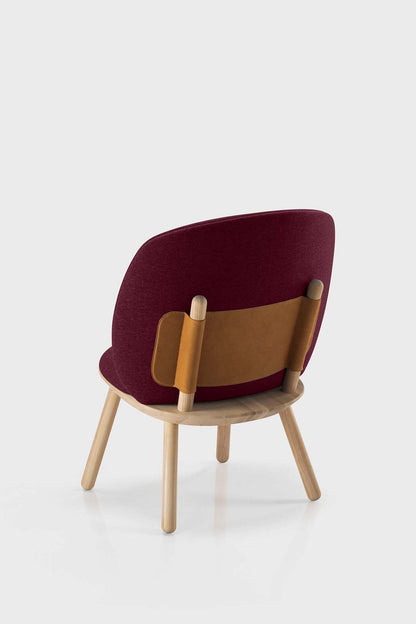 Aquamarine Poppy Naïve Low Chair with a wooden frame and upholstered seat in earthy tones, modern furniture design.
