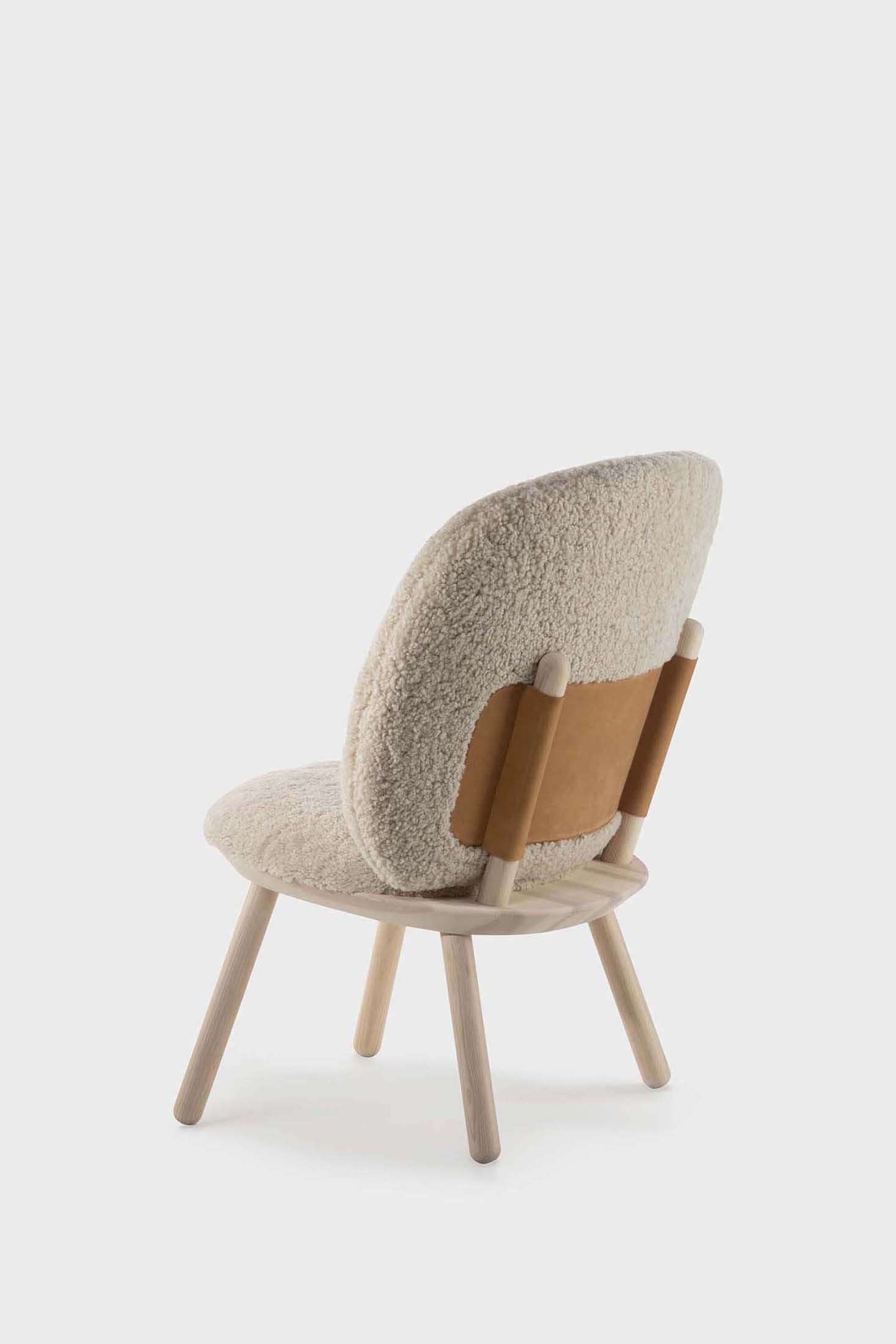 Aquamarine Poppy Naïve Low Chair with sheep-shaped design, featuring soft fabric upholstery and wooden legs in a cozy living space.