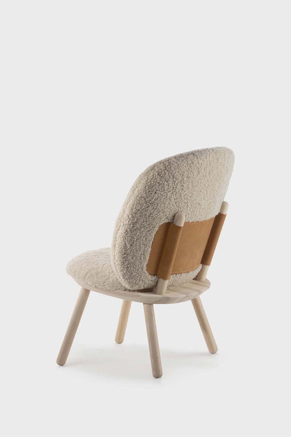 Aquamarine Poppy Naïve Low Chair with sheep-shaped design, featuring soft fabric upholstery and wooden legs in a cozy living space.