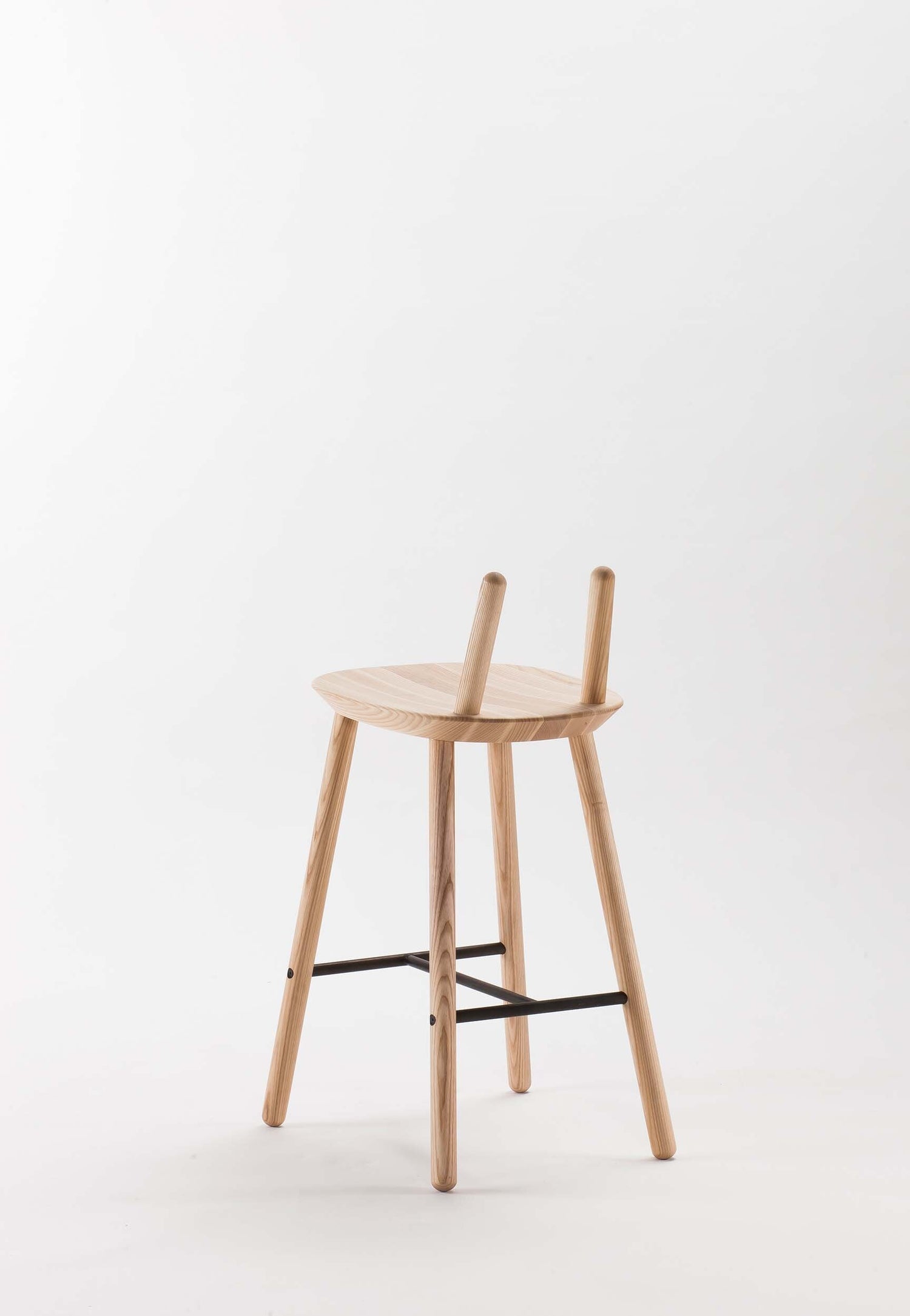 Naïve Semi Bar Stool by Aquamarine Poppy, modern furniture piece with sleek design and wooden legs, shown from side view.