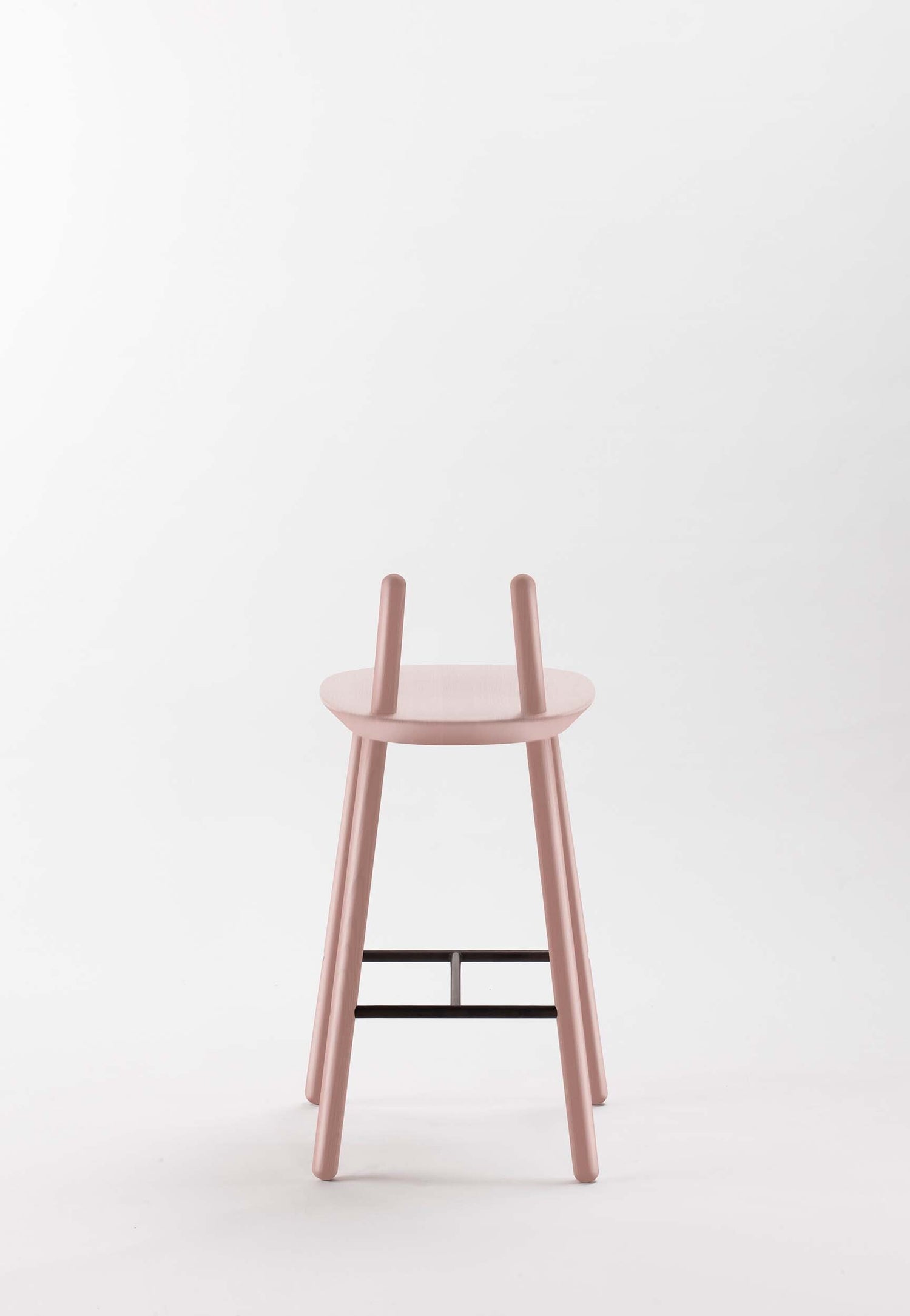 Dusty pink Naïve Semi Bar Stool by Aquamarine Poppy with a modern, curved design and wooden legs.