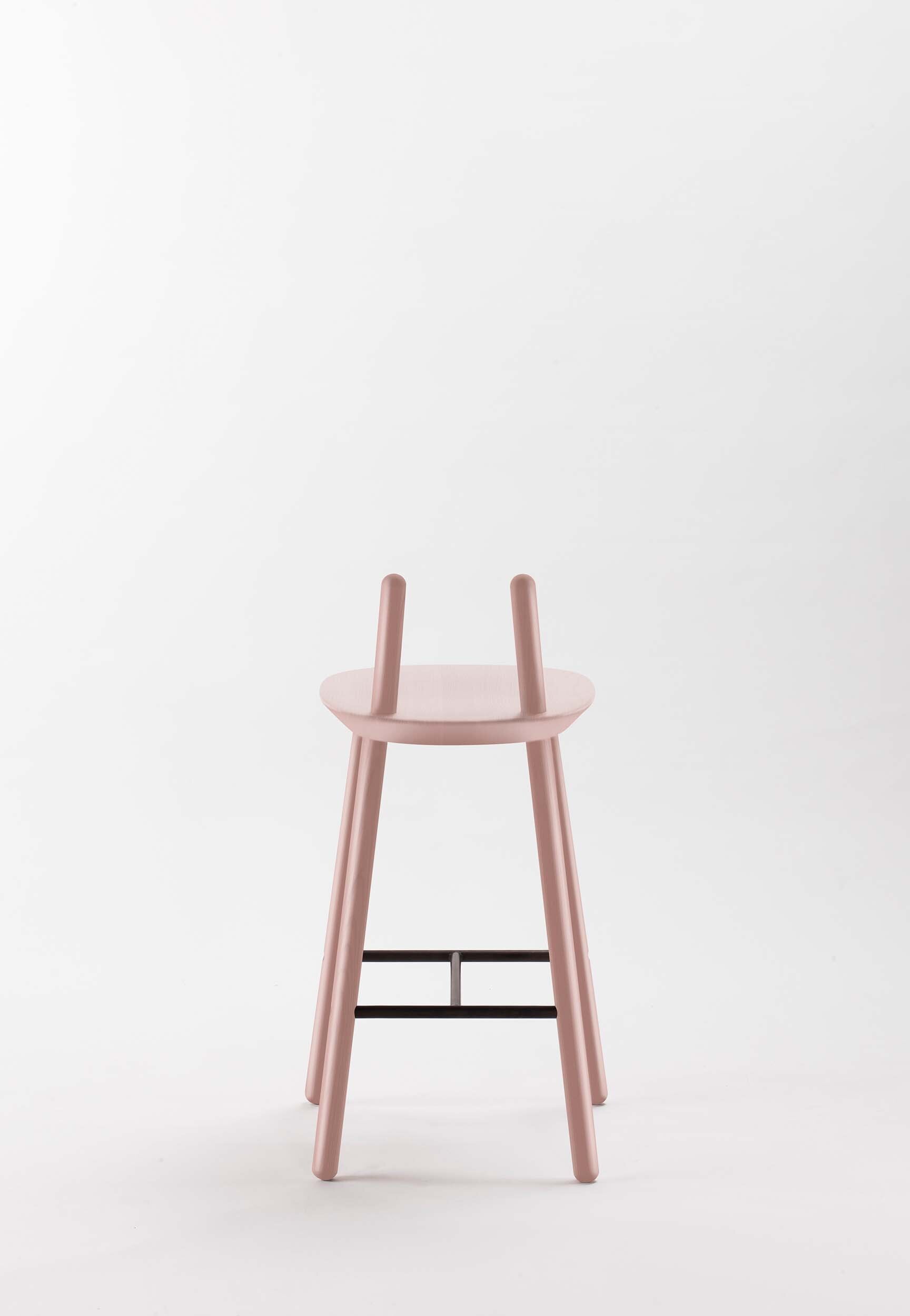 Dusty pink Naïve Semi Bar Stool by Aquamarine Poppy with a modern, curved design and wooden legs.