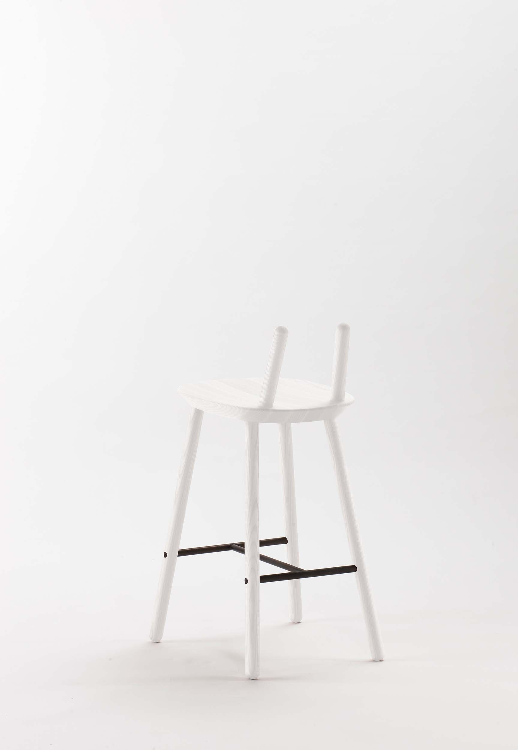 Naïve Semi Bar Stool by Aquamarine Poppy in white with sleek modern design and wooden legs on a light background.