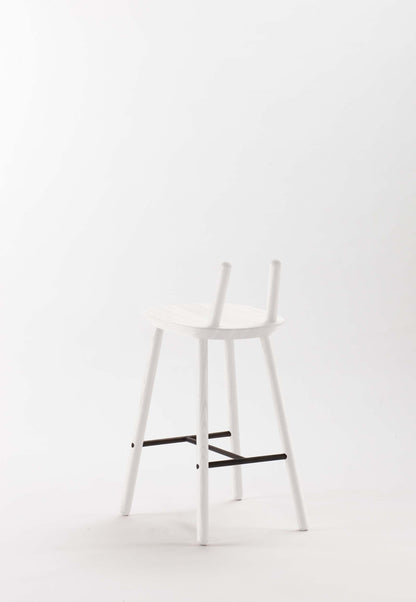 Naïve Semi Bar Stool by Aquamarine Poppy in white with sleek modern design and wooden legs on a light background.