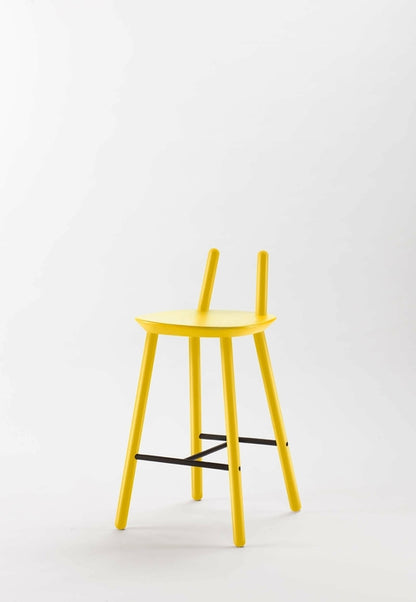Yellow Naïve Semi Bar Stool by Aquamarine Poppy, featuring a modern furniture design with a padded seat and sleek metal legs.