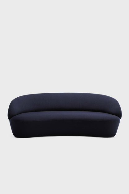 Aquamarine Poppy Naïve Sofa in vibrant blue, showcasing its sleek modern furniture design with plush cushions and stylish fabric.