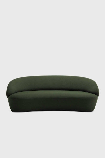Aquamarine Poppy Naïve Sofa in green fabric, showing a modern furniture piece with plush cushions and sleek design.